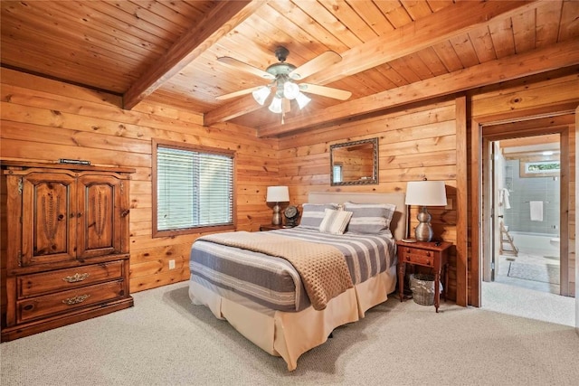 735 Trays Island Rd, Sapphire, NC 28774 - bedroom with a wood ceiling with exposed beams, light colored carpet, wooden walls, ensuite bath, and ceiling fan
