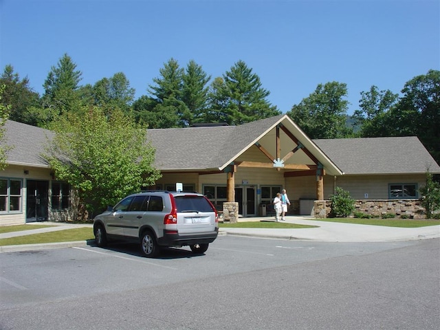 735 Trays Island Rd, Sapphire, NC 28774 - view of front facade featuring uncovered parking and a shingled roof