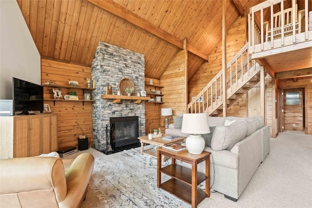 735 Trays Island Rd, Sapphire, NC 28774 - living room featuring a wood ceiling with exposed beams, carpet flooring, wooden walls, stairway, and high vaulted ceiling