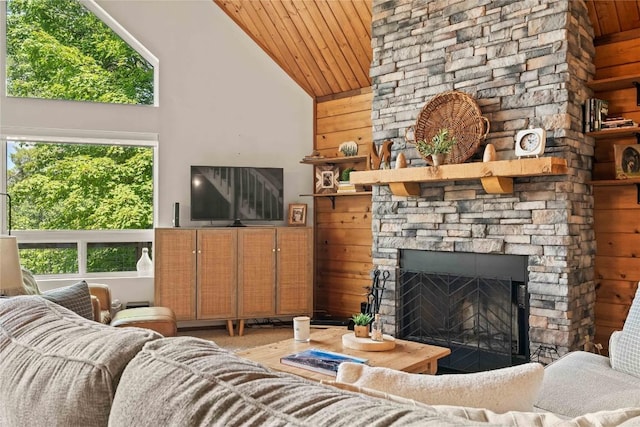 735 Trays Island Rd, Sapphire, NC 28774 - living room with wooden ceiling, wood walls, high vaulted ceiling, wood finished floors, and a fireplace