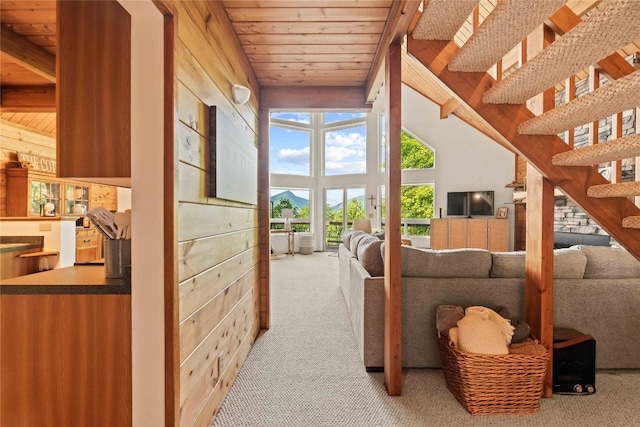 735 Trays Island Rd, Sapphire, NC 28774 - living area featuring carpet floors, wooden ceiling, and a high ceiling