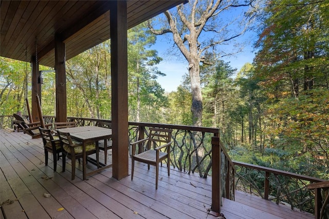 deck featuring outdoor dining space