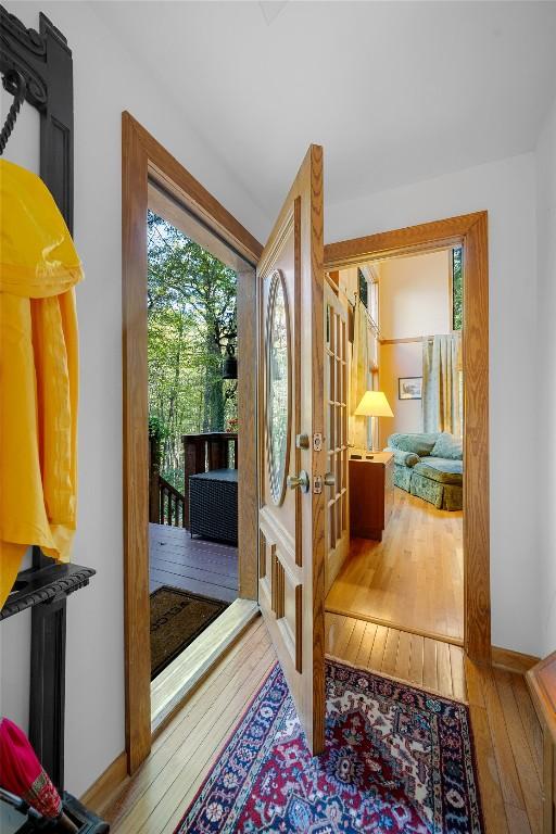 doorway to outside with french doors and hardwood / wood-style floors