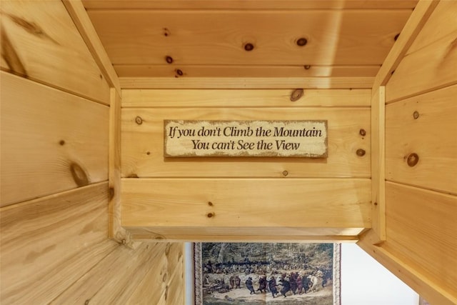 interior details featuring wooden walls