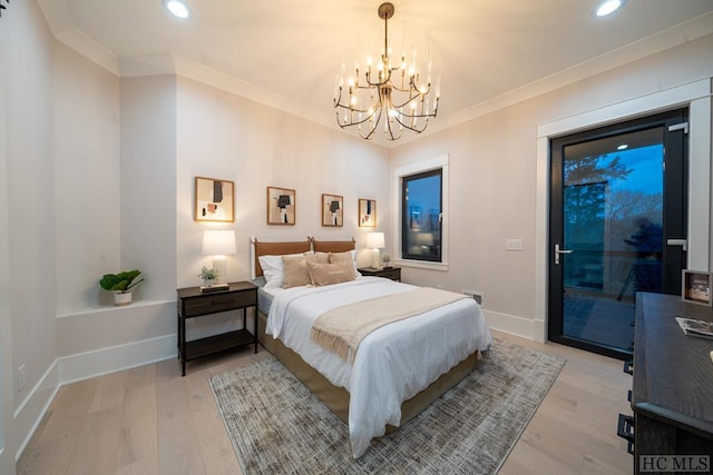 bedroom with a notable chandelier, ornamental molding, light wood-type flooring, and access to exterior