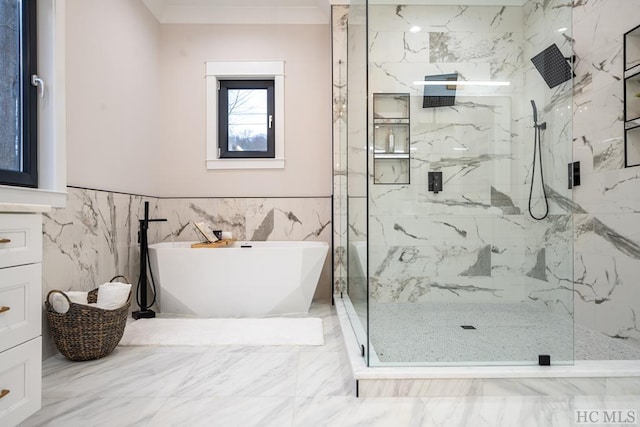 bathroom featuring separate shower and tub and vanity