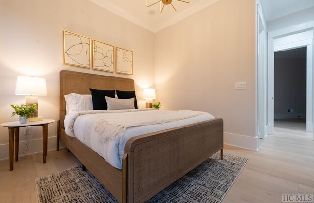 bedroom featuring light wood-type flooring