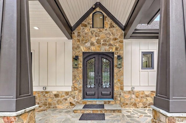 property entrance featuring french doors