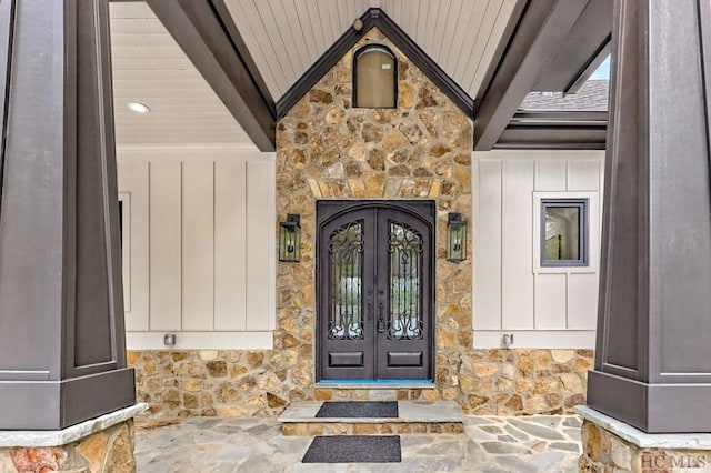 property entrance featuring french doors