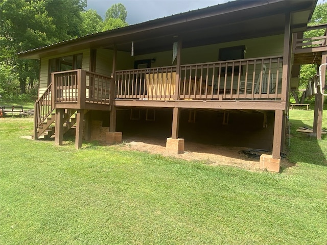 389 Kirkland Rd, Franklin, NC 28734 - back of property with a lawn, a wooden deck, and stairway