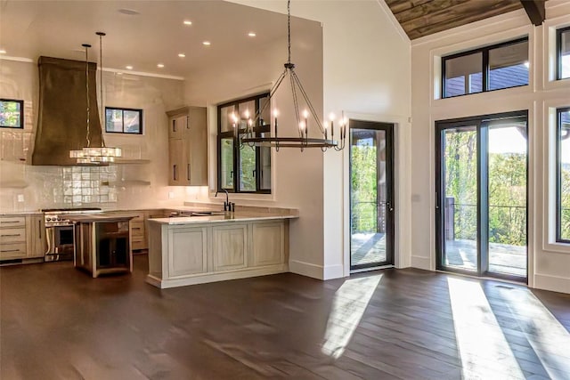 369 Firesong Ln, Glenville, NC 28736 - kitchen with a chandelier, a sink, light countertops, extractor fan, and baseboards