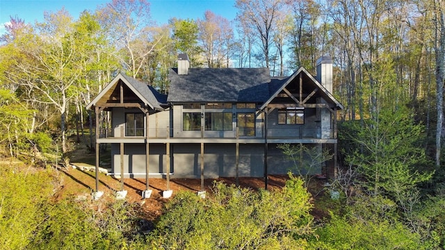 369 Firesong Ln, Glenville, NC 28736 - rear view of house with a chimney and a balcony