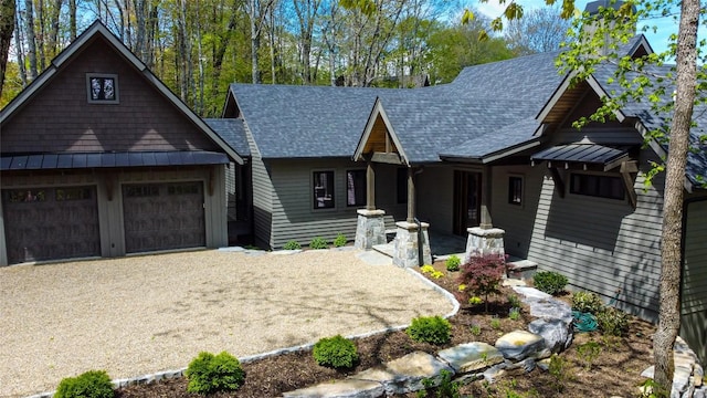 369 Firesong Ln, Glenville, NC 28736 - view of front facade featuring a standing seam roof, roof with shingles, metal roof, and driveway