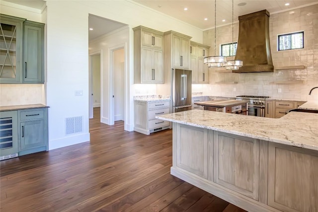369 Firesong Ln, Glenville, NC 28736 - kitchen featuring high quality appliances, beverage cooler, island exhaust hood, tasteful backsplash, and light stone counters