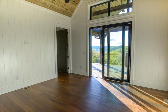 369 Firesong Ln, Glenville, NC 28736 - entryway with vaulted ceiling, hardwood / wood-style floors, wood ceiling, baseboards, and wood walls