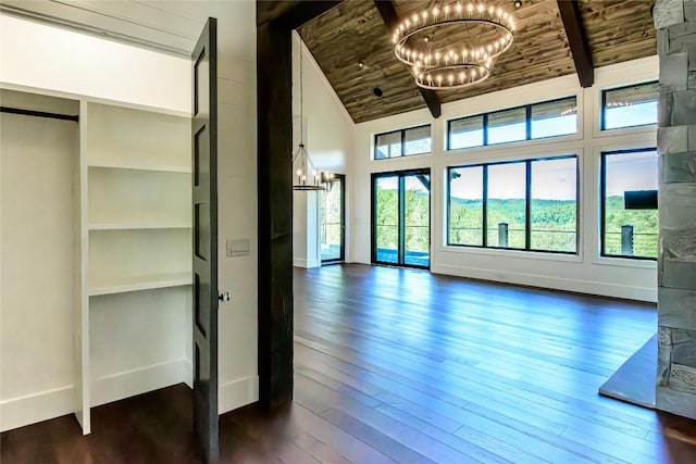 369 Firesong Ln, Glenville, NC 28736 - unfurnished living room with a chandelier, high vaulted ceiling, dark wood-style flooring, wood ceiling, and baseboards