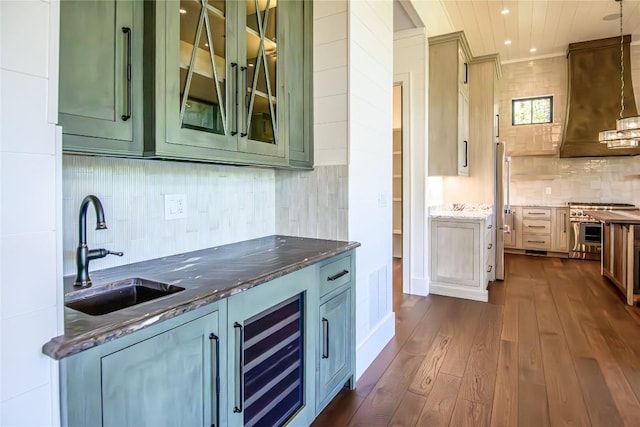 369 Firesong Ln, Glenville, NC 28736 - bar with a sink, beverage cooler, range hood, tasteful backsplash, and dark wood finished floors