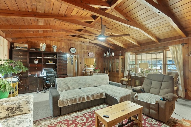 living room with wooden walls, vaulted ceiling with beams, carpet, ceiling fan, and wood ceiling