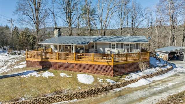 view of front of property featuring a deck