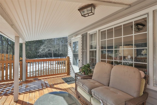 wooden terrace featuring a porch