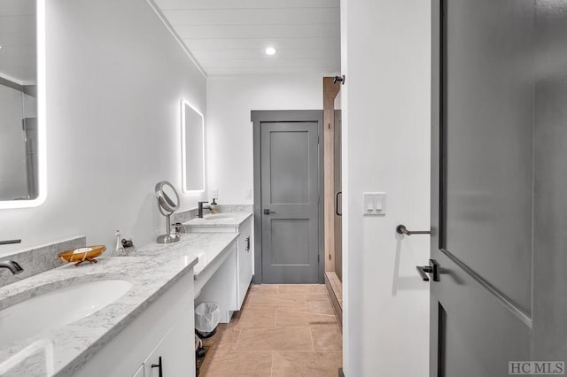 bathroom featuring vanity and tile patterned floors