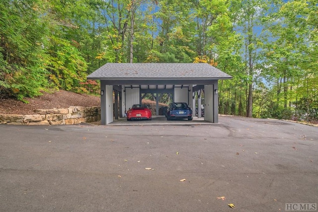 exterior space with a carport