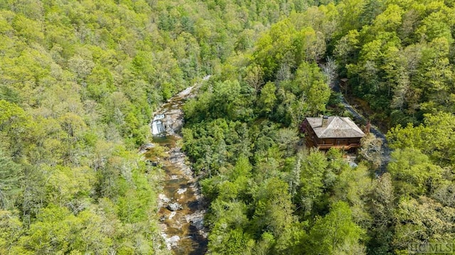 bird's eye view featuring a view of trees