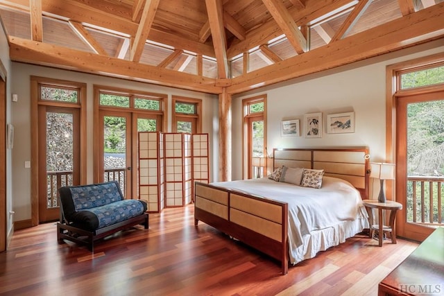 bedroom with access to exterior, wood ceiling, vaulted ceiling with beams, and wood finished floors