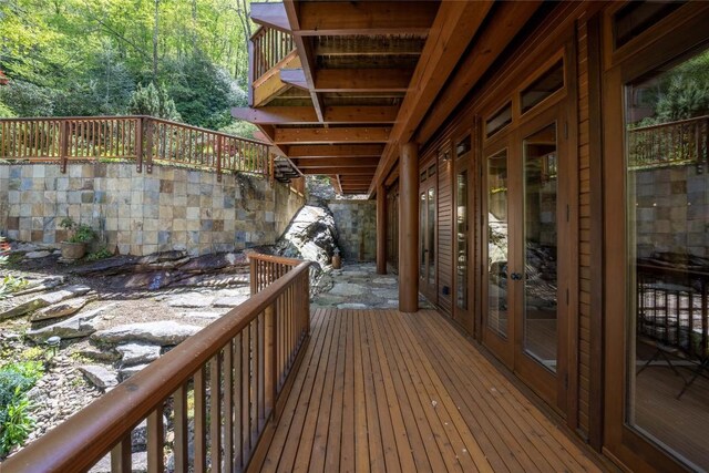 deck featuring a wooded view