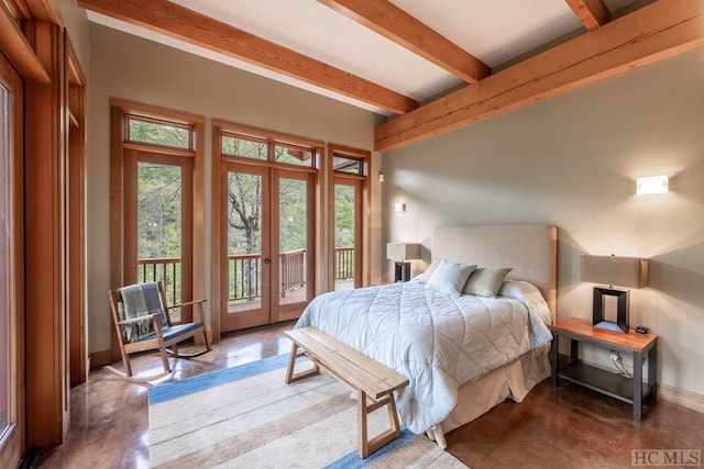 bedroom featuring access to outside, french doors, concrete floors, and baseboards