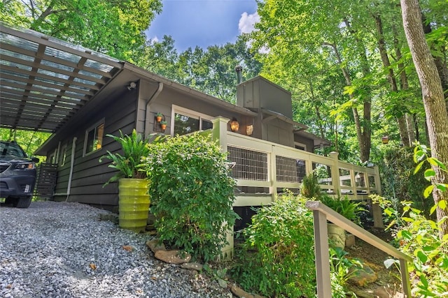 142 Wheatstone Dr, Glenville, NC 28736 - view of home's exterior featuring a chimney