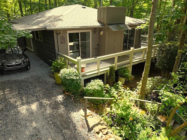 142 Wheatstone Dr, Glenville, NC 28736 - view of side of home with a shingled roof and a deck
