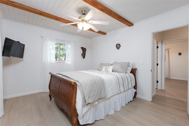 142 Wheatstone Dr, Glenville, NC 28736 - bedroom with beamed ceiling, light wood-style flooring, and a ceiling fan