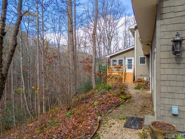 view of yard with a deck