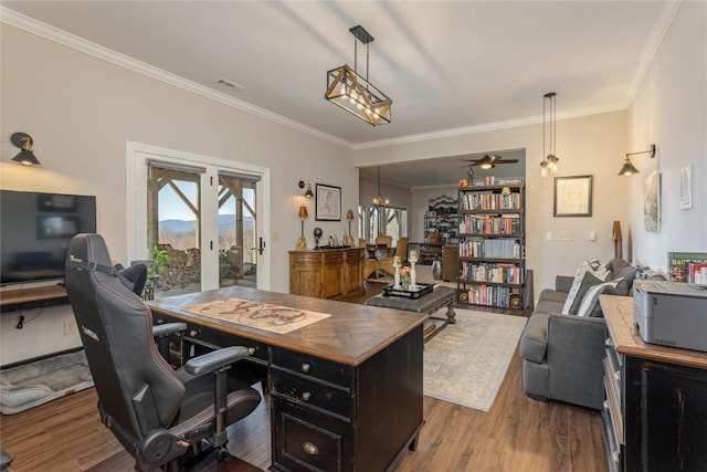 office with wood finished floors, ornamental molding, and ceiling fan