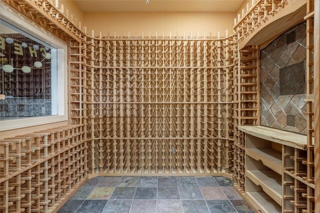 wine cellar featuring stone finish flooring