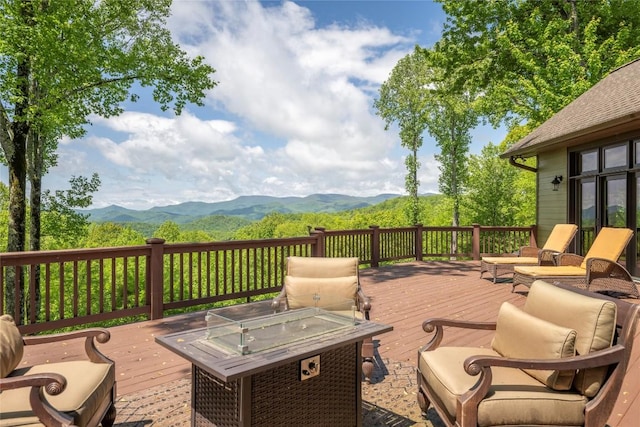 wooden terrace with a mountain view