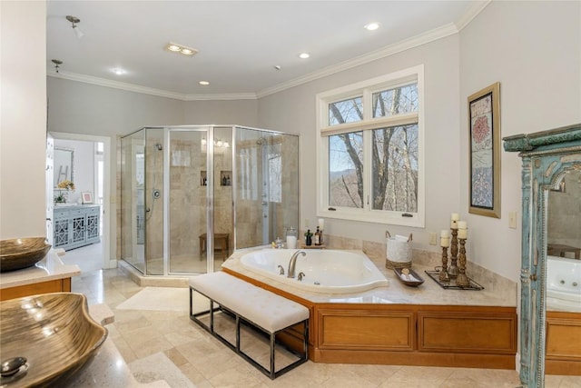 full bath with crown molding, a stall shower, a tub with jets, and tile patterned floors