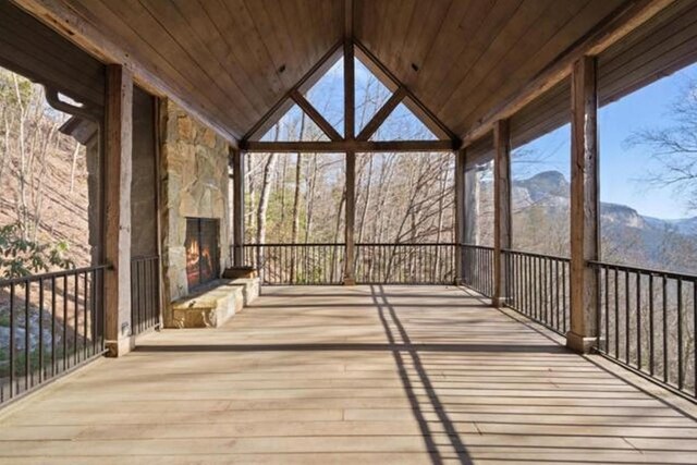 69 Old Cove Rd, Highlands, NC 28741 - unfurnished sunroom featuring a mountain view and vaulted ceiling