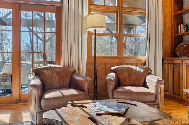 sitting room with light hardwood / wood-style flooring