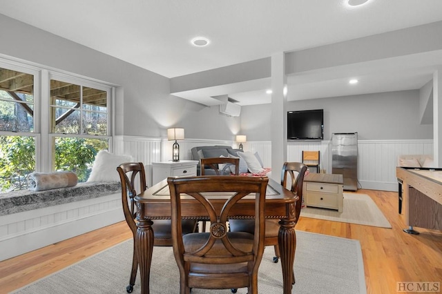 dining space with light wood-type flooring