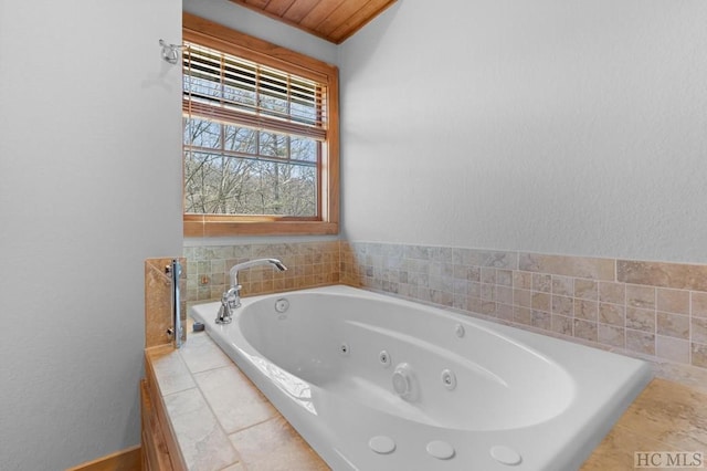 bathroom with tiled bath