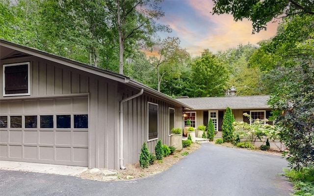 ranch-style home with a garage