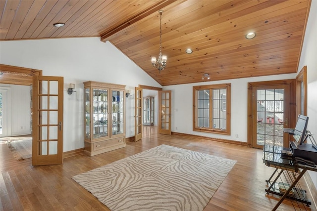 interior space featuring french doors, high vaulted ceiling, wood ceiling, and light hardwood / wood-style floors