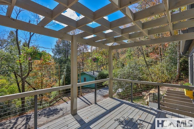 wooden terrace with a pergola