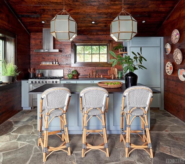 kitchen with lofted ceiling, gas stove, ventilation hood, sink, and wooden ceiling