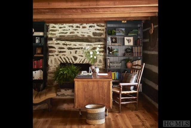 living area featuring hardwood / wood-style floors