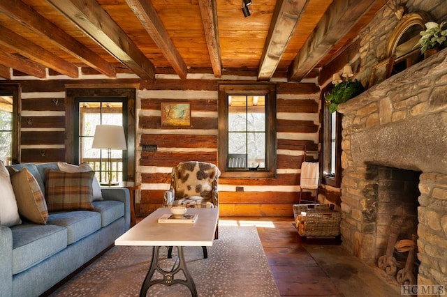 living room featuring beam ceiling, wood-type flooring, wood walls, and wooden ceiling