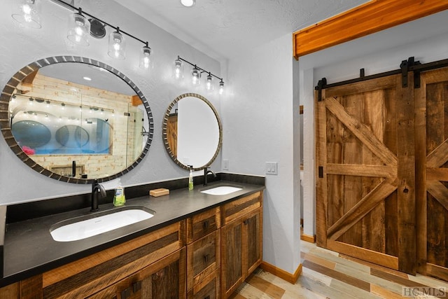 bathroom with vanity and hardwood / wood-style flooring