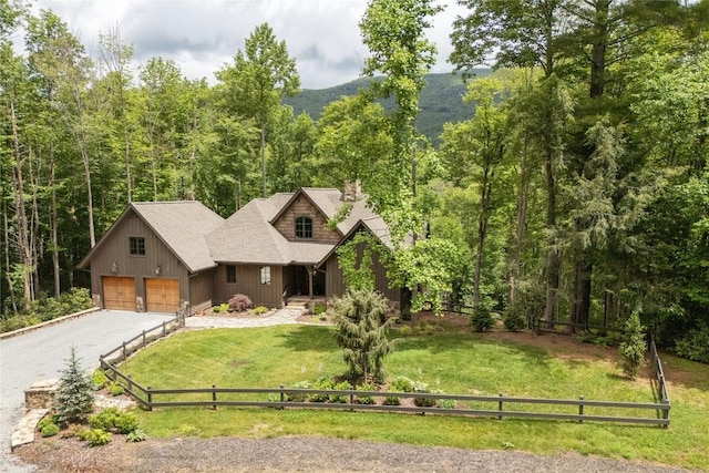 510 Boiling Springs Rd, Sapphire, NC 28774 - rustic home with roof with shingles, a chimney, board and batten siding, a wooded view, and driveway